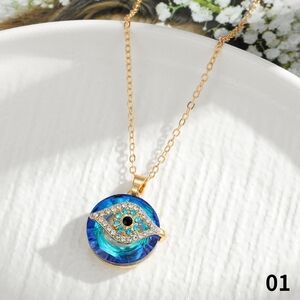 Evil eye necklace gold over